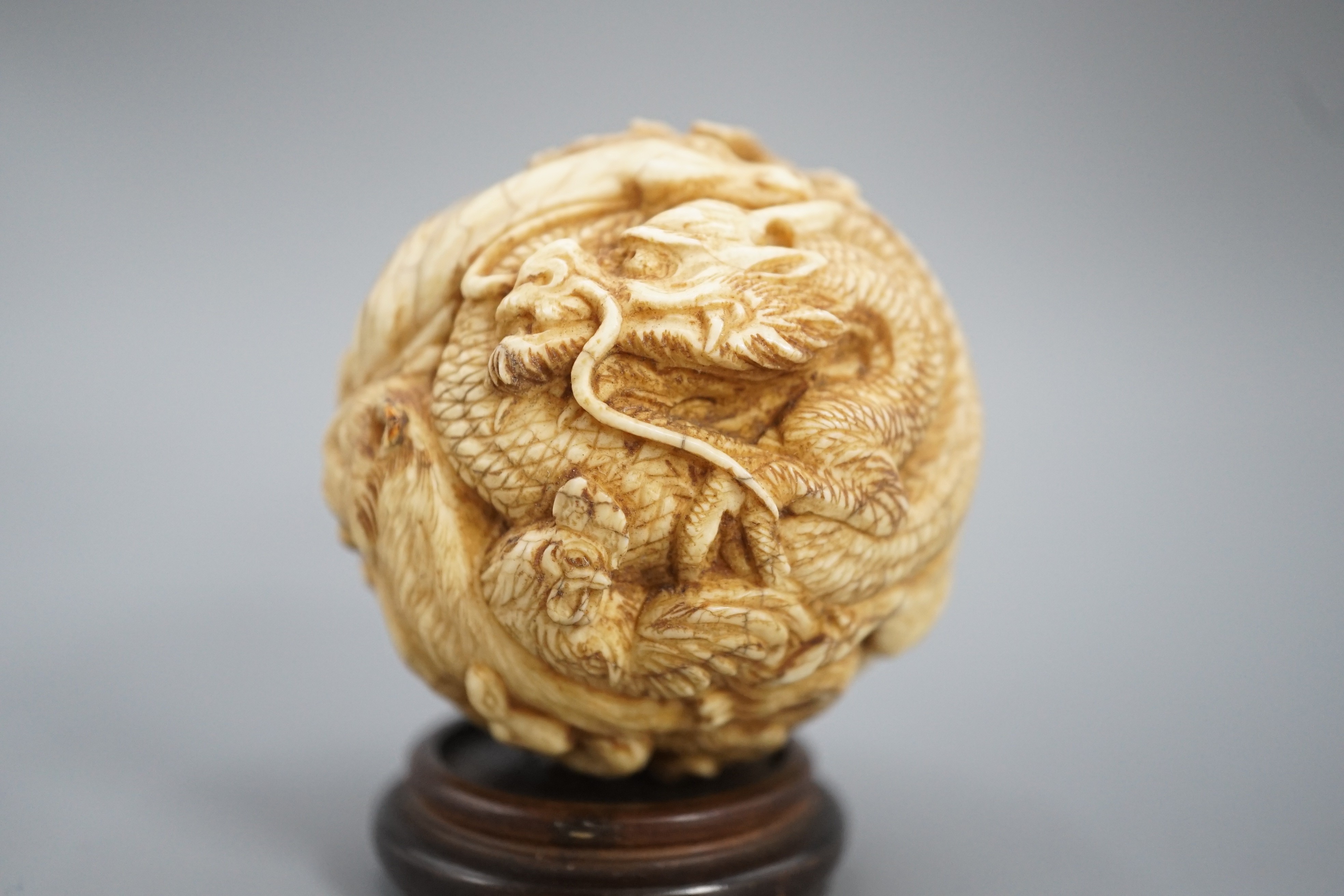 A Japanese ivory ‘Zodiac animal’ ball, early 20th century, 5cm